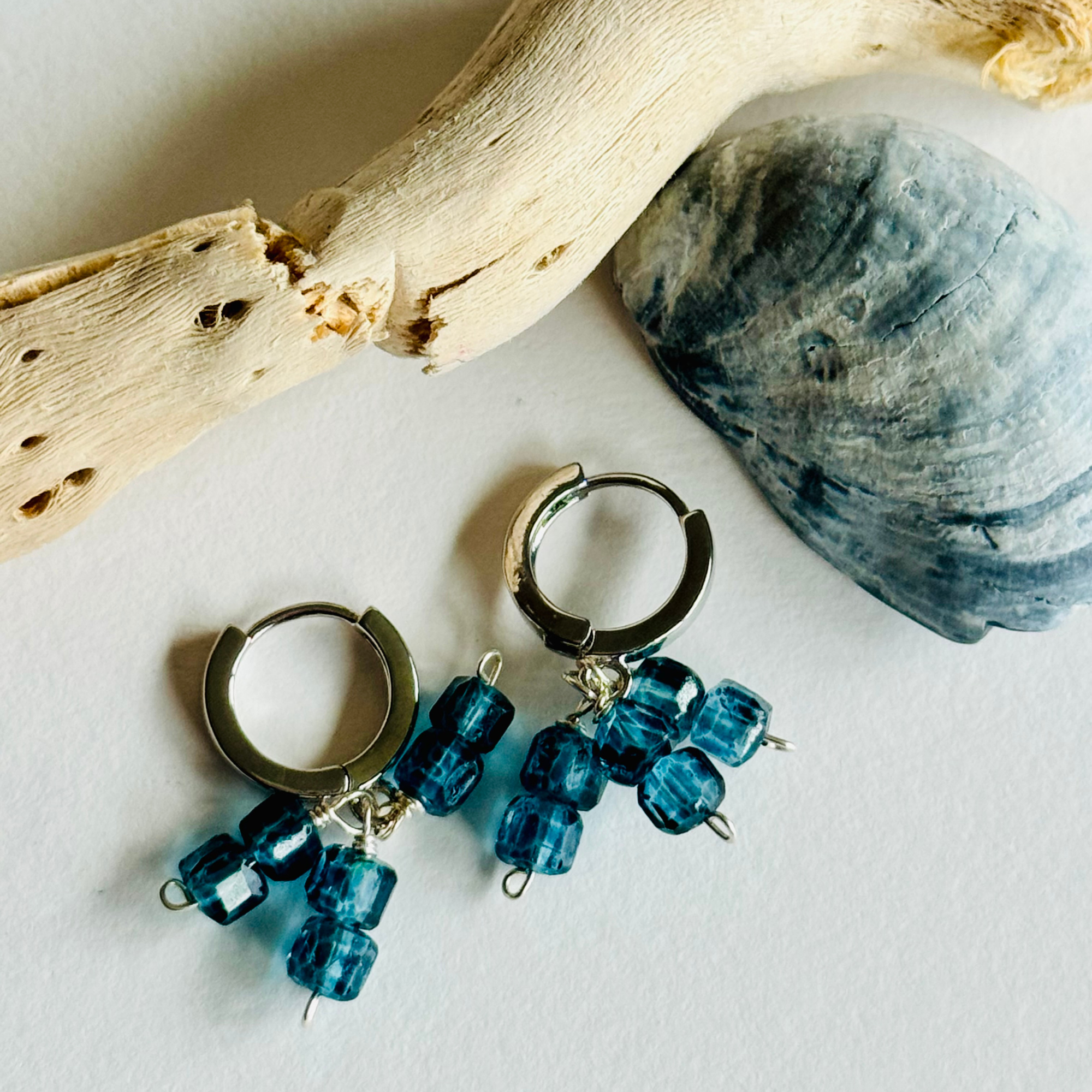 Mystic Blue Topaz Trio Silver Huggie Earrings