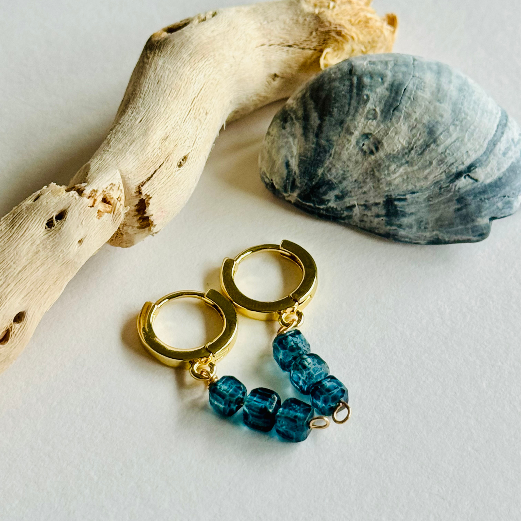 Mystic Blue Topaz Huggie Earrings